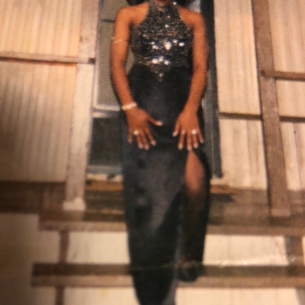 Long black prom dress size 9 with sequins beads.